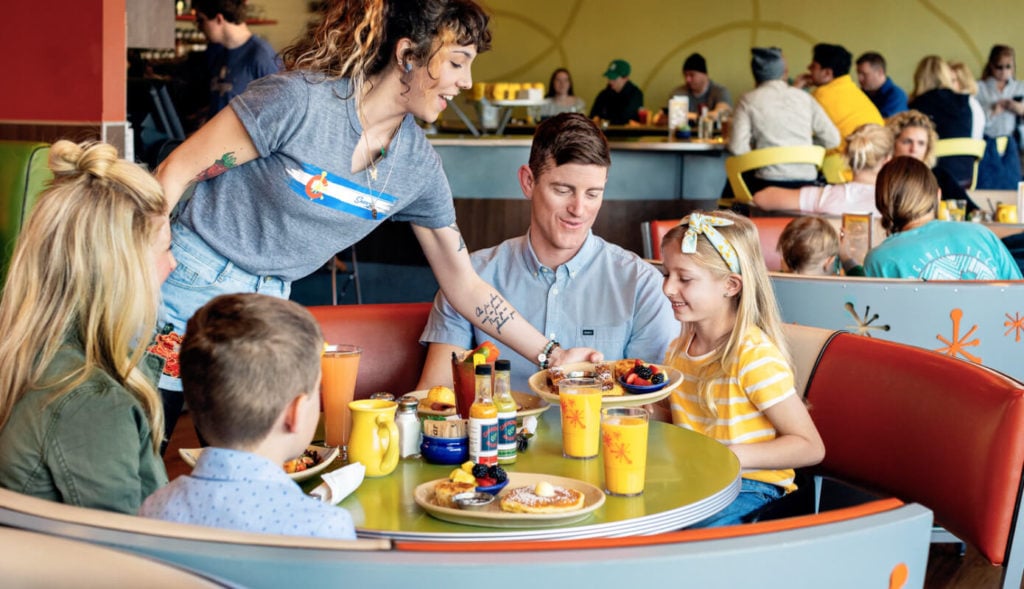 Snoozer serving a family breakfast